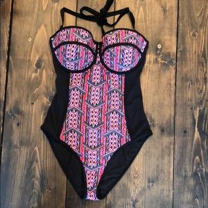Multi colored swimsuit bra sized